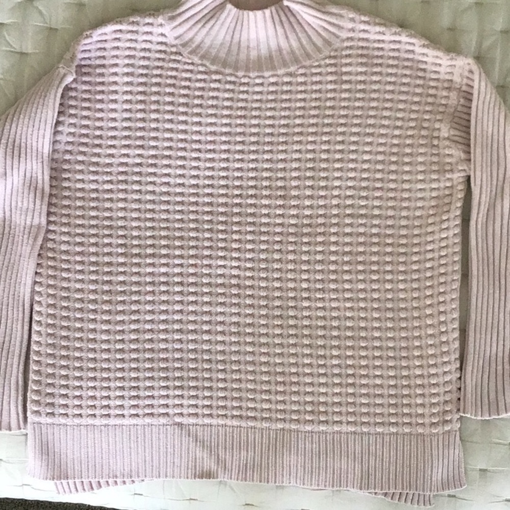 Cozy light pink sweater.